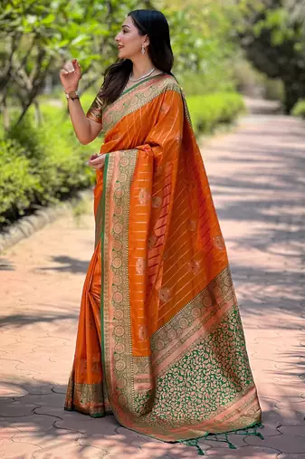 Orange soft silk contrast zari woven saree