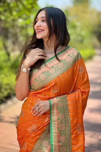 Orange soft silk contrast zari woven saree