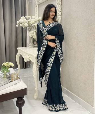 Women embroidered dark teal saree 1