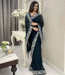 Women embroidered dark teal saree