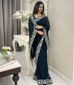 Women embroidered dark teal saree