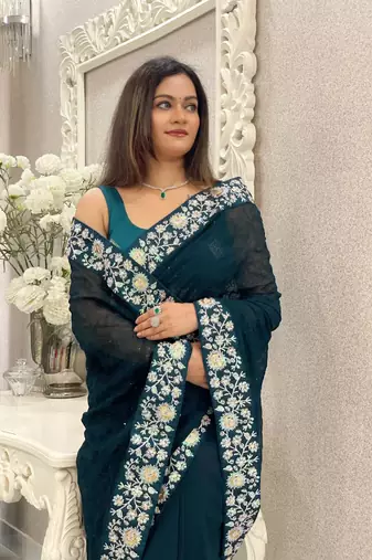 Women embroidered dark teal saree