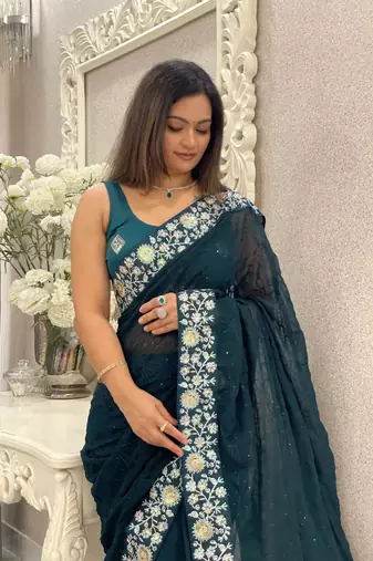 Women embroidered dark teal saree