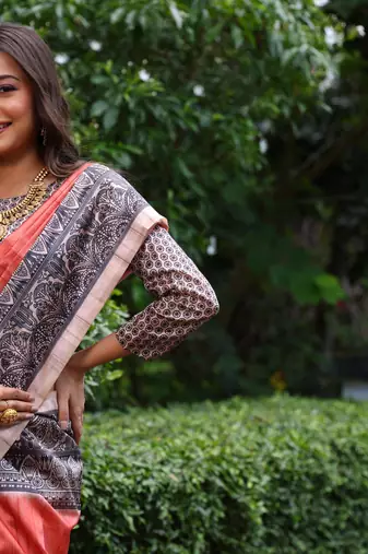 Orange soft tussar silk blend printed saree festive wear
