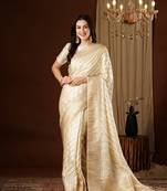 Cream glamorous jacquard satin silk blend saree