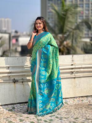 Sea green wevon meenakari ikkat patola silk blendceremonial saree 4