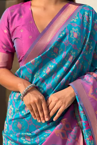 Blue wevon meenakari ikkat patola silk blendceremonial saree