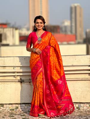 Orange wevon meenakari ikkat patola silk blendceremonial saree 1