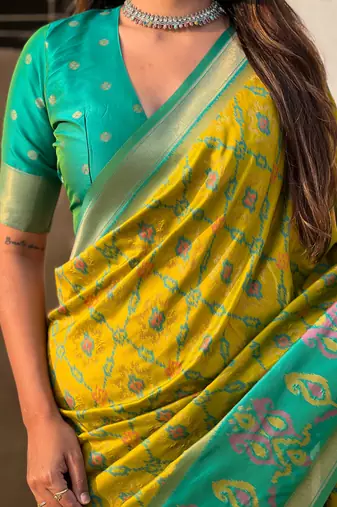 Green wevon meenakari ikkat patola silk blendceremonial saree