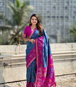 Blue wevon meenakari ikkat designer patola silk blendceremonial saree