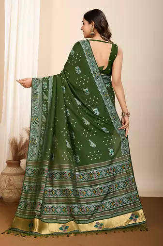 Green soft silk blendc wevon meenakari ceremonial saree