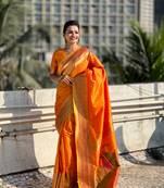 Orange soft silk blendc weaving figure pallu ceremonial saree