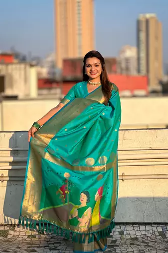 Sea green soft silk blendc weaving figure pallu designer ceremonial saree