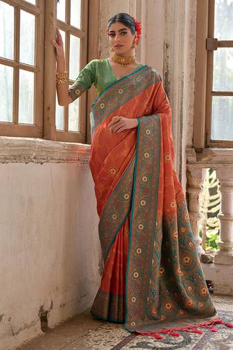 Peach banarasi silk blend weaving saree with zari woven fancy tassels