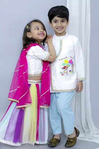 Kids playing holi print white holi lehnga set