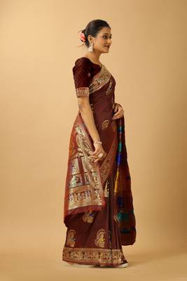 Brown woven design silk blend saree with blouse 1
