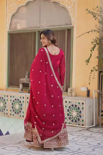 Pink georgette sequins embroidered flared gown with heavy dupatta