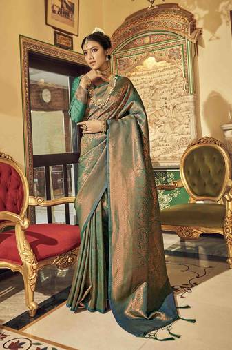 dark green kanchipuram silk blend saree with unstitched blouse piece