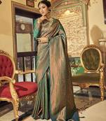 dark green kanchipuram silk blend saree with unstitched blouse piece