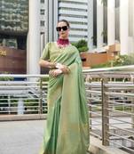 sea green kanchipuram silk blend saree with unstitched blouse piece