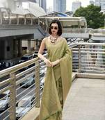 pista kanchipuram silk blend saree with unstitched blouse piece