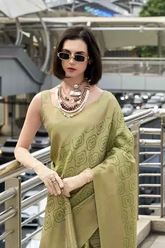 pista kanchipuram silk blend saree with unstitched blouse piece