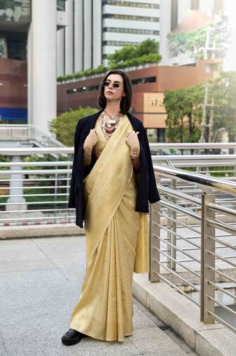 gold kanchipuram silk blend saree with unstitched blouse piece
