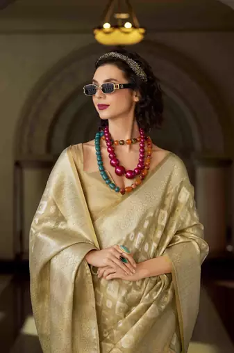 beige tissue silk blend saree with unstitched blouse piece
