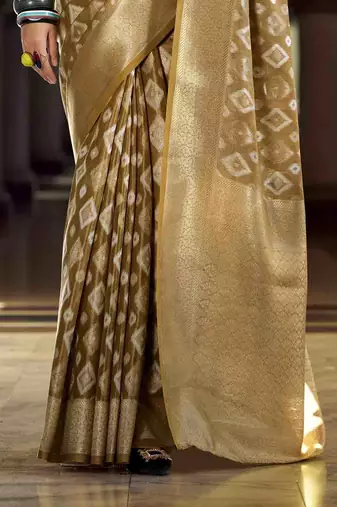 chiku tissue silk blend saree with unstitched blouse piece