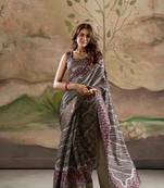grey dola silk blend saree with unstitched blouse piece