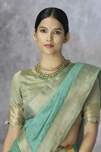 sea green cotton silk blend saree with unstitched blouse piece