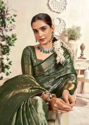 dark green silk blend blend saree with unstitched blouse piece 2