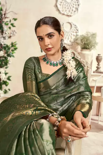 dark green silk blend blend saree with unstitched blouse piece