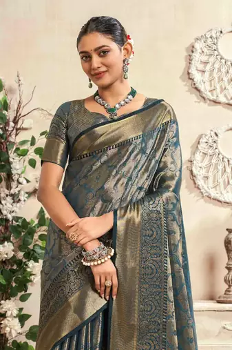 teal silk blend blend saree with unstitched blouse piece
