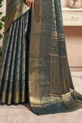 teal silk blend blend saree with unstitched blouse piece