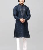 men's blue kurta set with embroidery motif