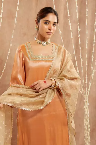 Orange scallop tissue kurta with 
narrow pants