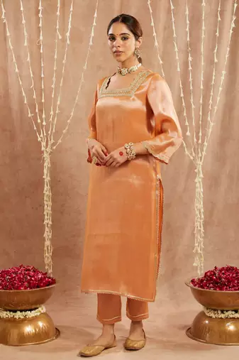 Orange scallop tissue kurta with 
narrow pants