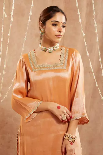 Orange scallop tissue kurta with 
narrow pants