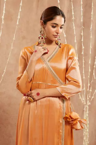 Orange shimmer tissue angrakha with 
narrow pants