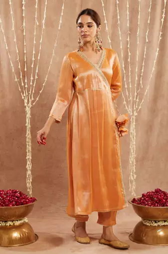 Orange shimmer tissue angrakha with 
narrow pants