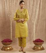 Olive green embroidered kurta with 
narrow pants