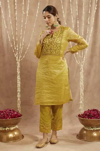 Olive green embroidered kurta with 
narrow pants
