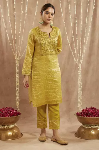 Olive green embroidered kurta with 
narrow pants