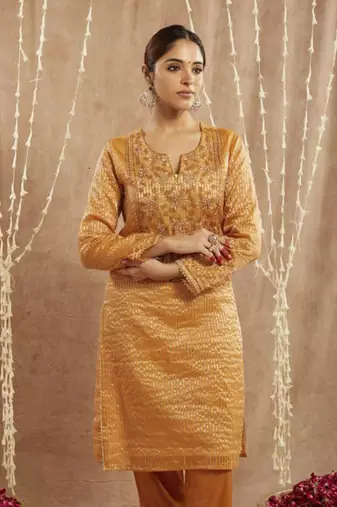 Orange glory embroidered kurta with 
narrow pants