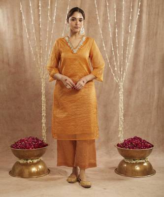 Orange lily floral embroidred kurta with flared pants 1