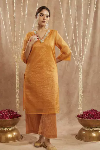 Orange lily floral embroidred kurta with flared pants