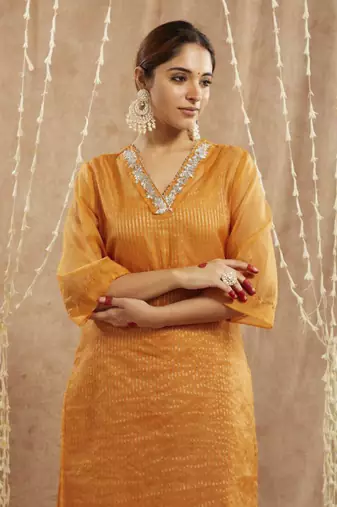 Orange lily floral embroidred kurta with flared pants