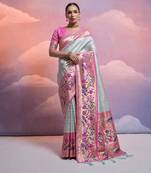 Sea green banarasi silk blend weaving saree with zari woven fancy tassels