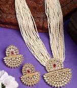  women's gold toned red stones & kundan studded jewellery set